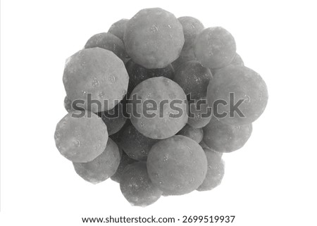 A dense cluster of textured, spherical objects varying in shade from light gray to dark, resembling tiny celestial bodies or a microscopic cellular structure against black