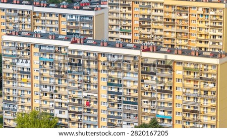 Dense residential district with multiple large apartment buildings providing housing for city dwellers