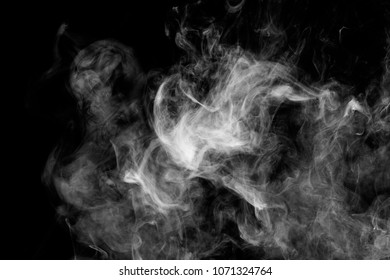 Dense White Smoke On A Black Isolated Background. Background Of Smoke Vape