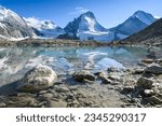 Dent Blanche and reflection in a glacial lake in Val d