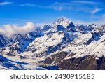 Dent Blanche summit towering above the ski slopes of the Zermatt winter sports resort in the Swiss Alps, Canton of Valais, Switzerland