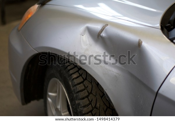 Dent repair in car\
fender