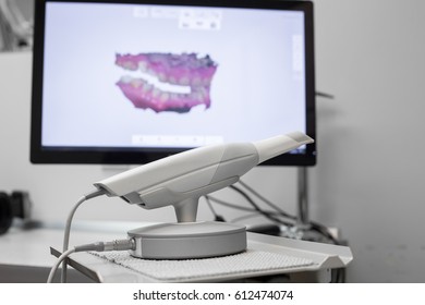 Dental 3d Scanner And Monitor In The Dentist's Office