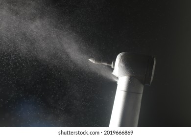 Dental Aerosol Coming Out From High Speed Rotary Instrument For Tooth Preparation In Daily Dental Practice. The Aerosol Could Contain Corona Virus.