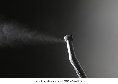 Dental Aerosol Coming Out From High Speed Rotary Instrument For Tooth Preparation In Daily Dental Practice. The Aerosol Could Contain Corona Virus.