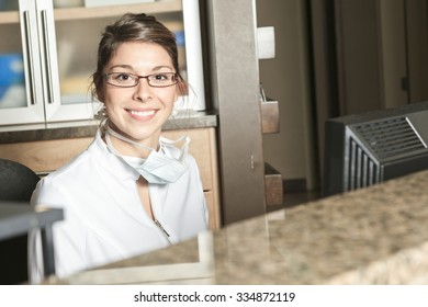 A Dental Assistance Receptionist Appointment At The Dentist Office