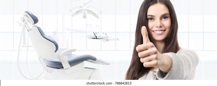 Dental Care Concept, Beautiful Smiling Woman Hands Thumbs Up On Dentist Clinic With Chair Background, Web Banner Template