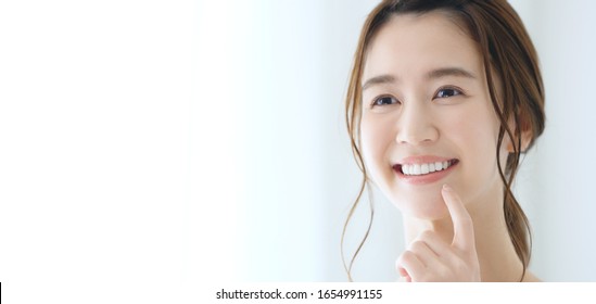 Dental Care Concept Of A Young Asian Woman.