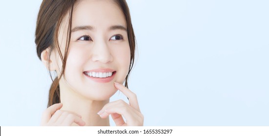 Dental care concept of a young asian woman.