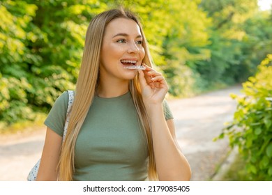 Dental Care. Woman Using Removable Clear Braces Aligner. Woman With White Smile, Healthy Straight Teeth Using Invisible Teeth Tray.