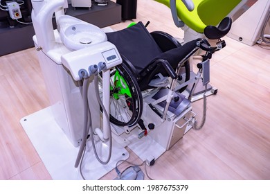 Dental Chair Disabled Patients. Dental Chair With Wheelchair Top View. Dental Equipment For Working With People Disabilities. Wheelchair In Dentist Office. Treating Teeth For Patients Disabilities.