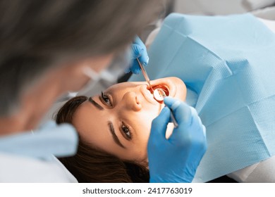 Dental check-up for a patient's teeth. High quality photo. - Powered by Shutterstock