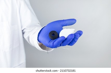 Dental Floss Close Up. Dentist Shows How To Use The Thread Correctly. Different Types Of Flossing. The Concept Of Proper Oral Care. Selective Focus.