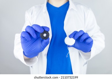 Dental Floss Close Up. Dentist Shows How To Use The Thread Correctly. Different Types Of Flossing. The Concept Of Proper Oral Care. Selective Focus.