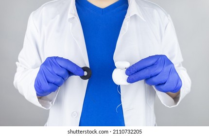 Dental Floss Close Up. Dentist Shows How To Use The Thread Correctly. Different Types Of Flossing. The Concept Of Proper Oral Care. Selective Focus.