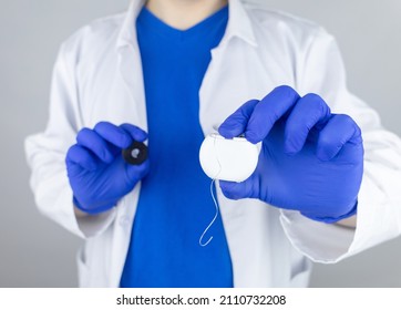 Dental Floss Close Up. Dentist Shows How To Use The Thread Correctly. Different Types Of Flossing. The Concept Of Proper Oral Care. Selective Focus.