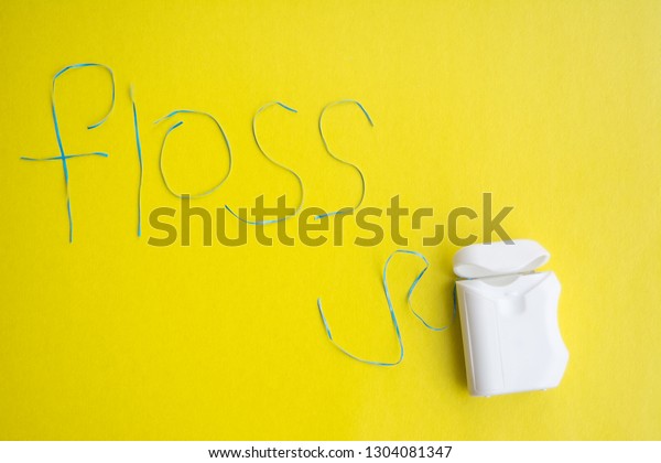 Download Dental Floss On Yellow Background Concept Stock Photo Edit Now 1304081347 Yellowimages Mockups