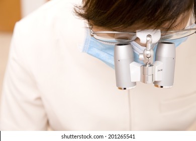 Dental Hygienist Wearing A Binocular Loupe