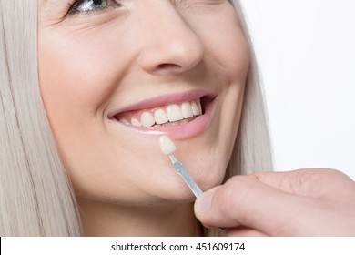 Dental Laboratory: Using Shade Guide To Check Veneer Of Tooth Crown