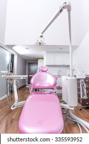 Dental Office With Pink Dental Chair