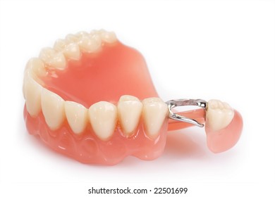 Dental Prosthesis On Bright Background