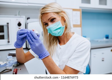 Dental Technician Making Dentures. Dental Prosthesis, Prosthetics Work.