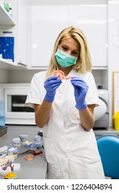 Dental Technician Making Dentures. Dental Prosthesis, Prosthetics Work.