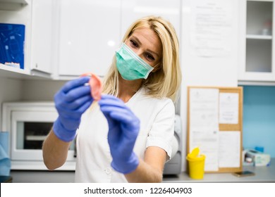 Dental Technician Making Dentures. Dental Prosthesis, Prosthetics Work.