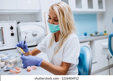 Dental Technician Making Dentures. Dental Prosthesis, Prosthetics Work.