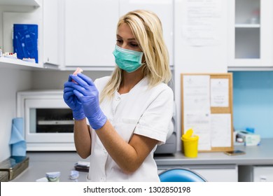 Dental Technician Making Dentures. Dental Prosthesis, Prosthetics Work. 