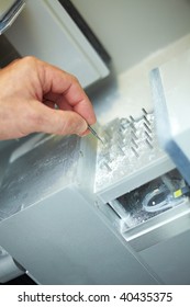 Dental Technician Working With A CAD CAM