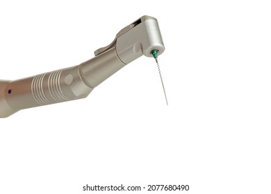 Dental tip handpiece with a tool for root canal treatment, endodontic treatment, file expander, dental filling, isolated on a white background