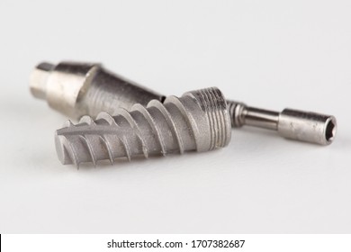 Dental Titanium Implant With Locking Elements Isolated On White Background