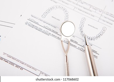 Dental Tools And Equipment On Dental Chart