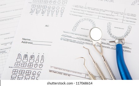 Dental Tools And Equipment On Dental Chart