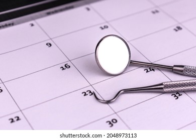 Dental Tools Mirror, Prince, Hook On Calendar. Dentist Visit Concept.