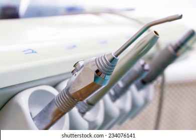 Dental tools on a dentist&amp;#39;s chair. - Shutterstock ID 234076141