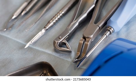 Dental Tools For Tooth Extraction On The Surgical Table Before The Operation