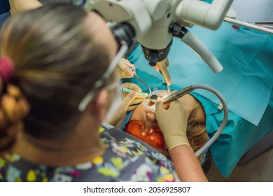 Dental Treatment With A Microscope. Woman Having Teeth Examined At Dentists. Appointment At The Dentist. Lifestyle, Real Life