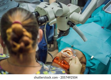 Dental Treatment With A Microscope. Woman Having Teeth Examined At Dentists. Appointment At The Dentist. Lifestyle, Real Life