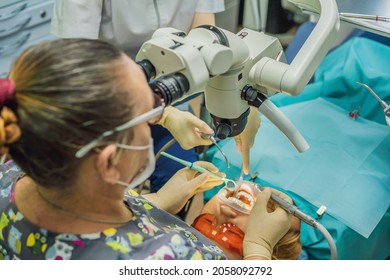 Dental Treatment With A Microscope. Woman Having Teeth Examined At Dentists. Appointment At The Dentist. Lifestyle, Real Life