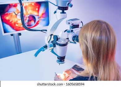 Dental Treatment Under The Microscope. Equipment For Dentists. Equipment For The Dental Office. Medical Industry. Modern Medical Center. Dentist With A Microscope. Human Health.