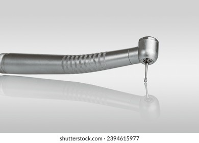 dental turbine handpiece for caries treatment isolated on white background, close-up - Powered by Shutterstock