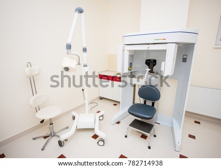 Dental X-ray unit and panoramic radiography machine in a dental office
