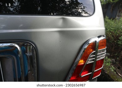 Dented from being hit from behind