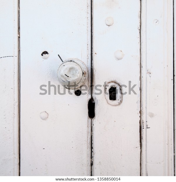 Dented Door Knob On Old White Stock Photo Edit Now 1358850014