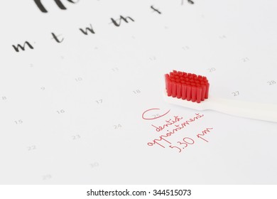 Dentist Appointment In Calendar With Toothbrush