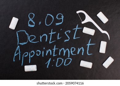 Dentist Appointment Reminder On Chalkboard.