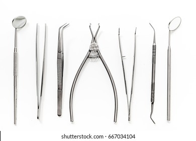 dentist desk with instruments on white background top view