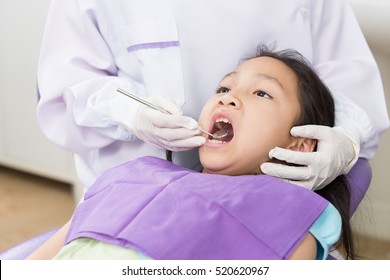 Dentist Examine Asian Girl Patient